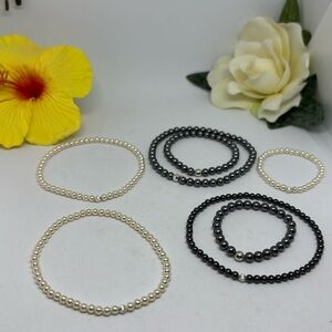 7 Swarovski pearl bracelets. 4mm and 3mm variety length